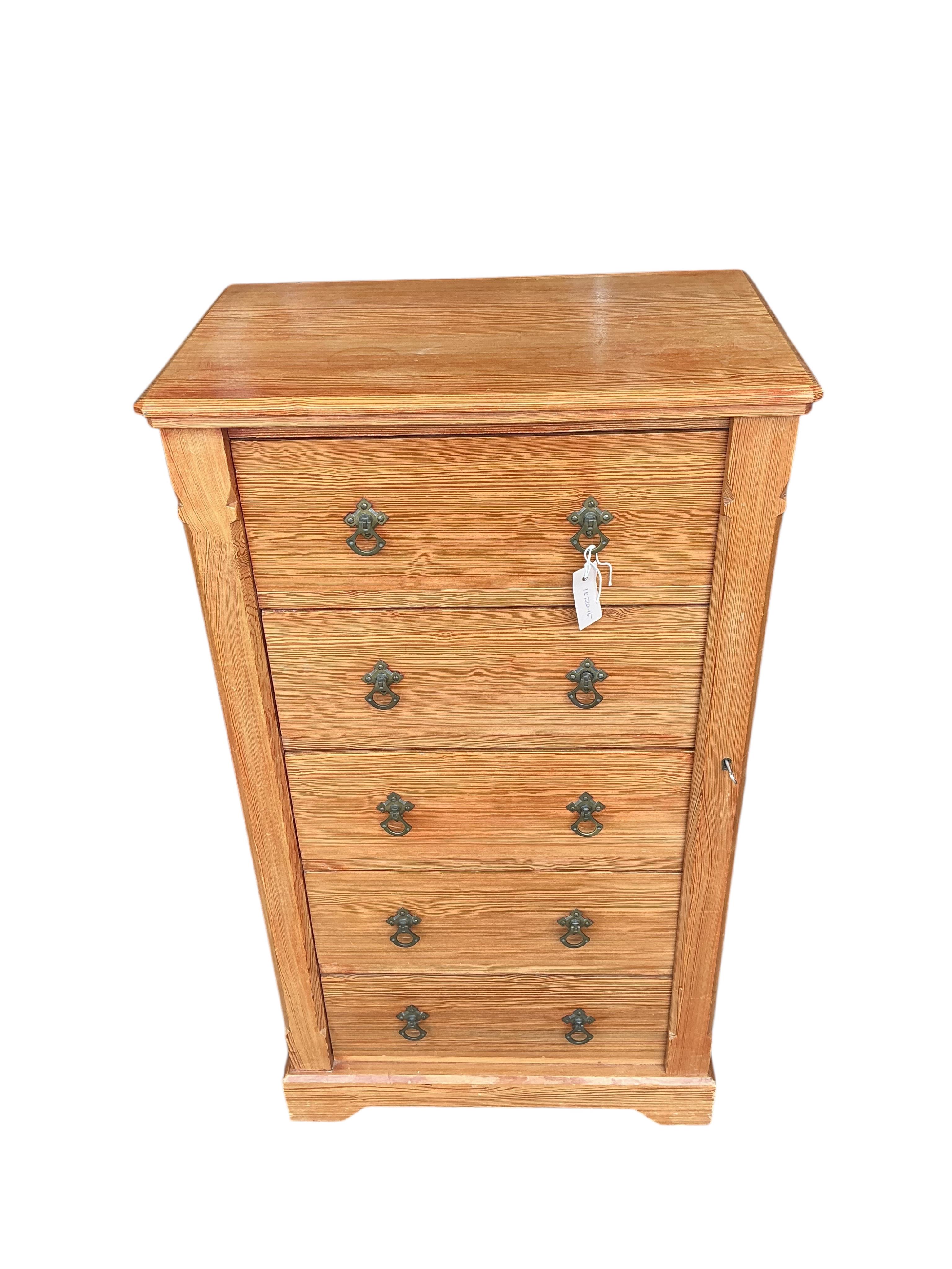A late Victorian pitch pine wellington chest, width 65cm, depth 40cm, height 116cm